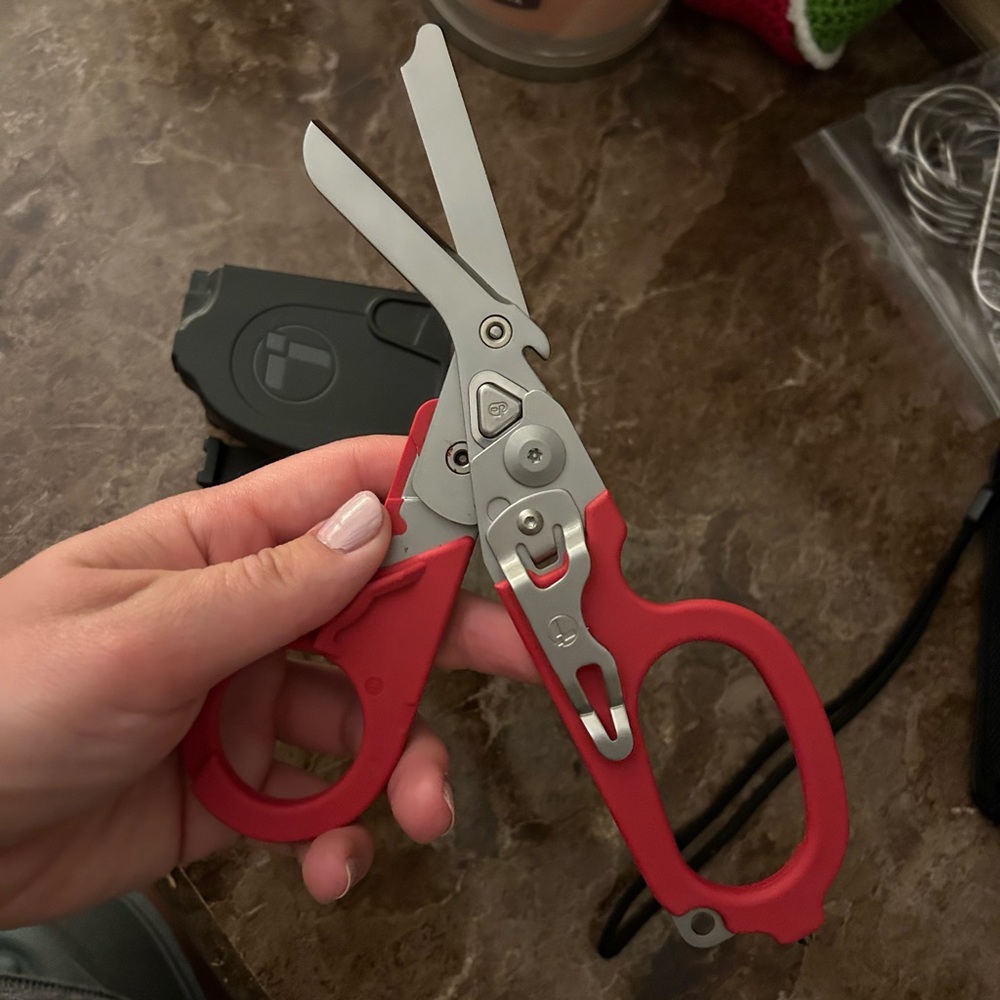 leather man nursing scissors